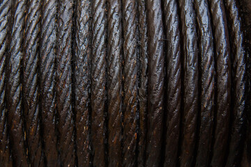 Greased steel cable close up.