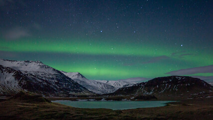 Northern Lights over lake in Iceland