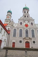 Obraz premium Basilica of Ulrich and Afra in Augsburg Germany . Catholic church with 15th-century foundations . Horology on the bell tower 