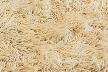 Close up woolen textile, soft and fluffy carpet