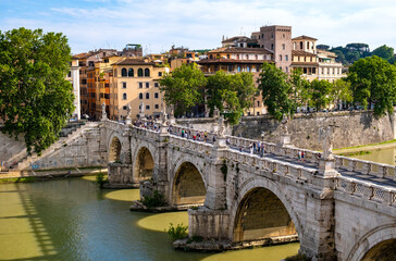 Fototapeta na wymiar Ponte Sant'Angelo, Saint Angel Bridge, known as Aelian Bridge or Pons Aelius over Tiber river in historic center of Rome in Italy