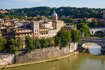 Fototapeta na wymiar Panoramic view of historic center of Rome in Italy with Tiber river, Ponte Vittorio Emanuele II bridge and Basilica of San Giovanni dei Fiorentini