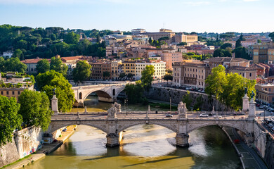 Panoramic view of historic center of Rome in Italy with Tiber river, Ponte Vittorio Emanuele II bridge, Castel Sant'Angelo castle and Trastevere quarter