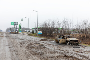 War in Ukraine. Chaos and devastatio at a gas station