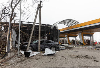War in Ukraine. Chaos and devastatio at a gas station