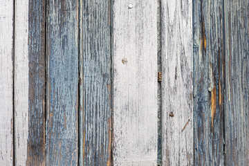 Texture of aged wood painted and degraded by the passage of time. Vertical boards.