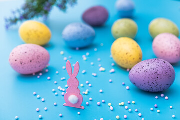 Easter decor in the form of a wooden bunny and eggs