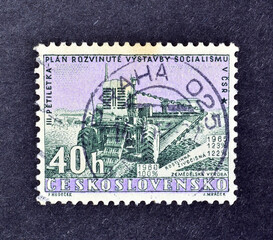 Cancelled postage stamp printed by Czechoslovakia, that shows Excavator, 3rd Five-Year Plan, circa...