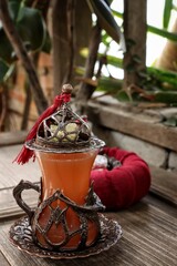 Indian fruit tea on wood background