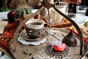 Indian desserts and hot black coffee