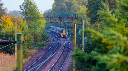 London commuter train in motion - Located on West Anglia Main Line serving the small town of...