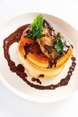 pancakes with chocolate sauce closeup