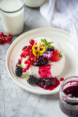 fresh ricotta with berries and flowers