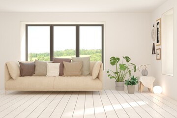 Fototapeta premium Minimalist living room in white color with sofa and summer landscape in window. Scandinavian interior design. 3D illustration