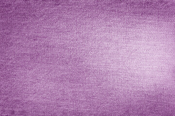 Denim background texture for design. Canvas denim. Denim purple jeans fabric. 