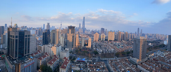 Fototapeta premium The awesome skyline of the city of Shanghai - looking towards Pudong and Lujiazui from Xizang road in the Puxi area of the city 