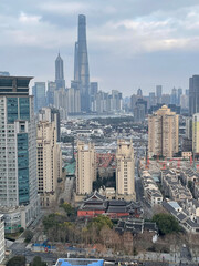 The awesome skyline of the city of Shanghai - looking towards Pudong and Lujiazui from Xizang road in the Puxi area of the city	