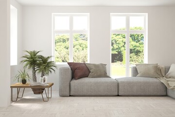 White living room with sofa and summer landscape in window. Scandinavian interior design. 3D illustration