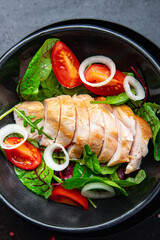 chicken breast salad Easter salad vegetable tomato, onion, green mix leaves lettuce keto or paleo diet fresh meal food snack on the table copy space food background 