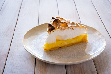 Lemon tart on wooden table
