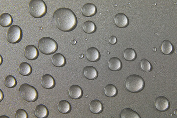 Fototapeta na wymiar Abstract water drops on grey silver background, macro, Bubbles close up