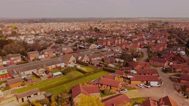 Suburban Small Village, Town Setting. Houses And Rooftops. Ariel Done Shot . Filmed East Yorkshire. England. UK