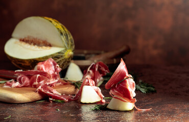 Juicy melon with prosciutto and rosemary.