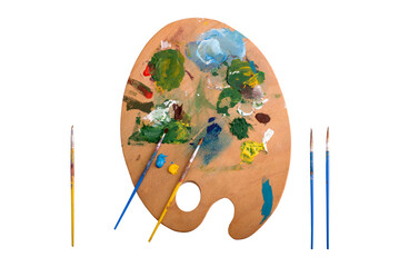 Top view of palette with different paints isolated on white background