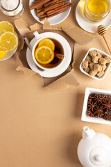 Cup of tea with lemon and honey on torn paper. Mug full green tea