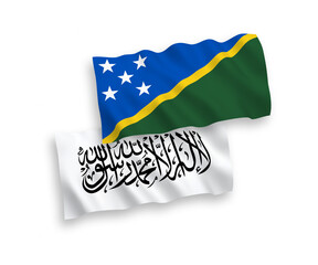 Flags of Solomon Islands and Islamic Emirate of Afghanistan on a white background