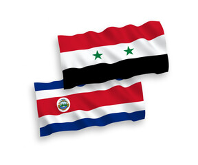 National vector fabric wave flags of Republic of Costa Rica and Syria isolated on white background. 1 to 2 proportion.
