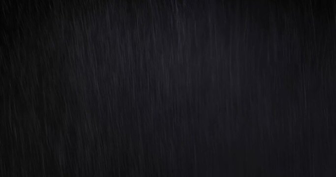 Water Drops following down on the black background. Drops of rain trickling down isolated. Best 4K footage Droplets of Water on Black Glass running down. Perfect for digital composing.