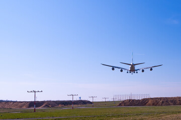 Landing Airbus A380 plane at Düsseldorf Airport in Germany