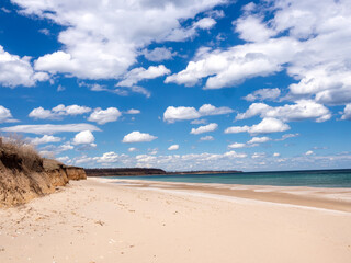 Fototapeta na wymiar Beautiful beach, sea and cloudy blue sky.