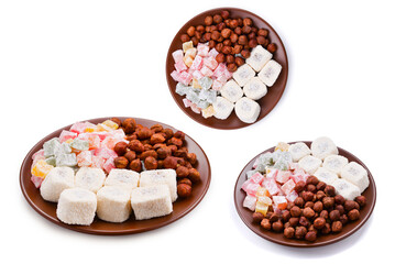 Rahat  and nuts on a plate isolated.