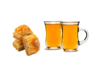 Turkish sweet baklava with turkish tea isolated on white background. .