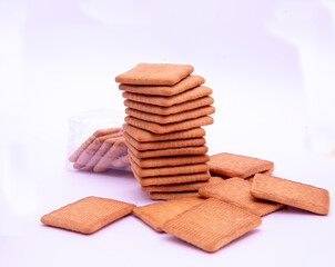 Wheat biscuits on white background.