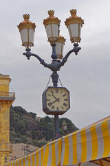 Fototapeta na wymiar Clock light pole