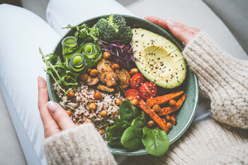 Woman with healthy meal. Bowl with fresh vegetables. Healthy eating or diet. Healthy food plate