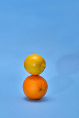 Orange and lemon on a blue background