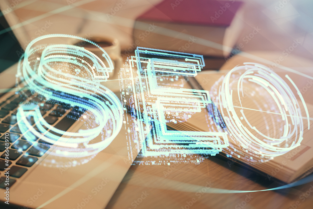 Aufkleber Double exposure of SEO writing and desktop with coffee and items on table background. Concept of search optimization.