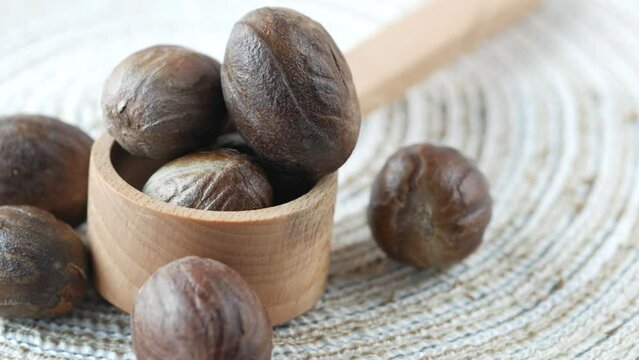 Ground nutmeg on table close up ,