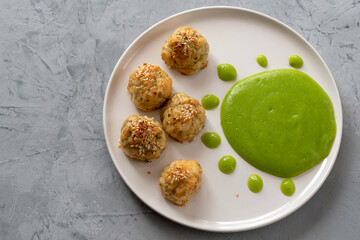 Fish meatballs with broccoli puree. Proper nutrition concept. Diet dish. Vegetarian food.