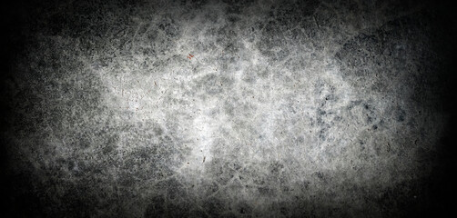 a black concrete background with a vignette is suitable for a horror concept or a gloomy news advertisement