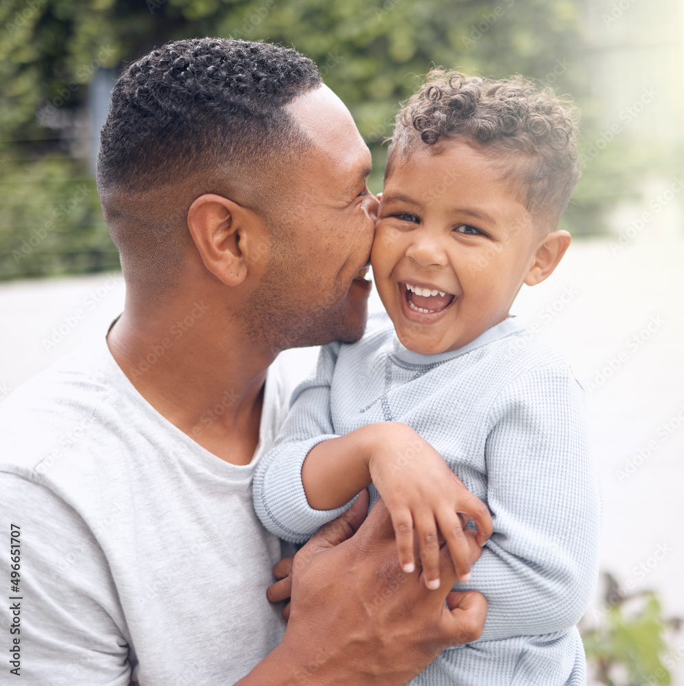 Canvas Prints A fathers love is the truest fortune. Shot of an adorable little boy having fun with his father in a garden.