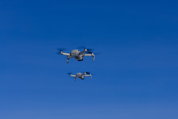 Two drones in fly.