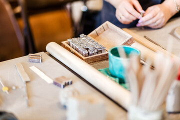 Letters for printing on wet clay. The concept of handmade