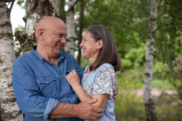 Obraz premium Portrait of caucasian senior couple in park