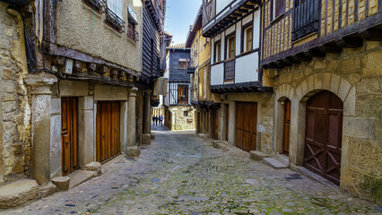 Fototapeta na wymiar Medieval alley with typical houses of the mountain of Salamanca, La Alberca.