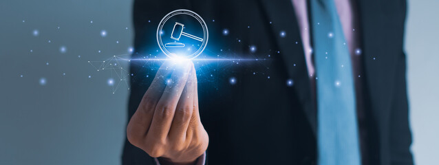 Businessman using hand holding hammer icon,futuristic line network, concept bid winner highest bidder in final lift,public sale property auctioned business competition,e-auction and online bidding